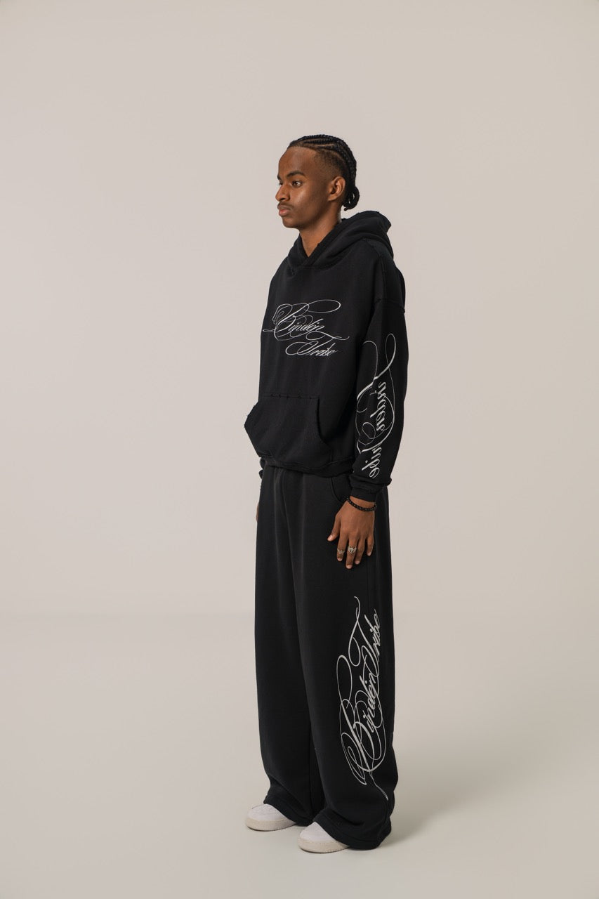 Pantalones de chándal baggy Signature - Negro
