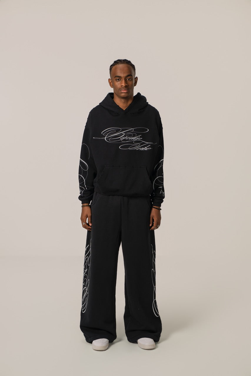 Pantalones de chándal baggy Signature - Negro
